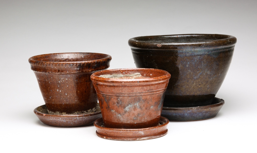 THREE AMERICAN REDWARE FLOWER POTS.