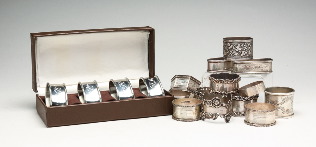 COLLECTION OF STERLING NAPKIN RINGS.