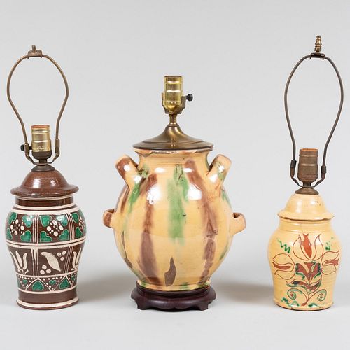 THREE EARTHENWARE JARS MOUNTED 3bd21a