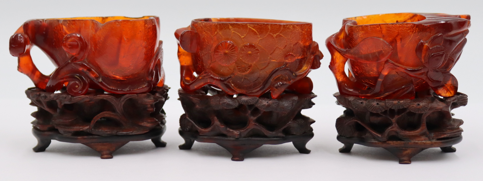 GROUPING OF 3 CARVED AMBER WATER 3bd35d