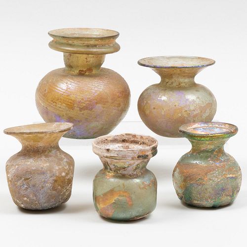 GROUP OF FIVE ROMAN GLASS VESSELSThe