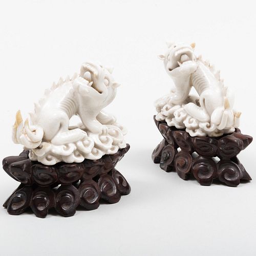 PAIR OF CHINESE WHITE GLAZED PORCELAIN