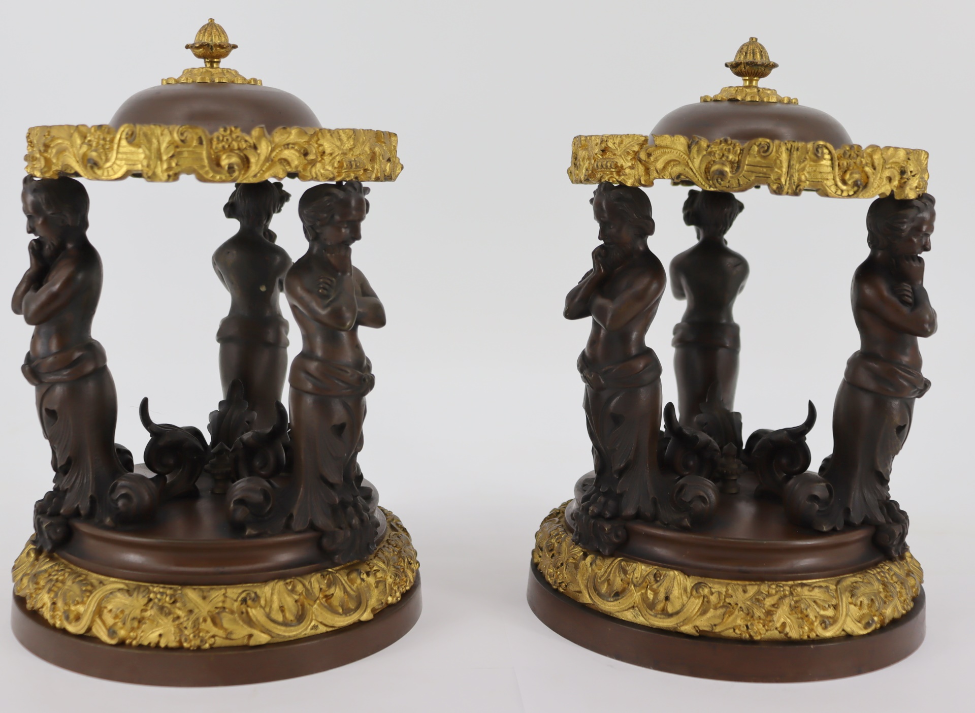 AN ANTIQUE PAIR OF GILT PATINATED 3bd728