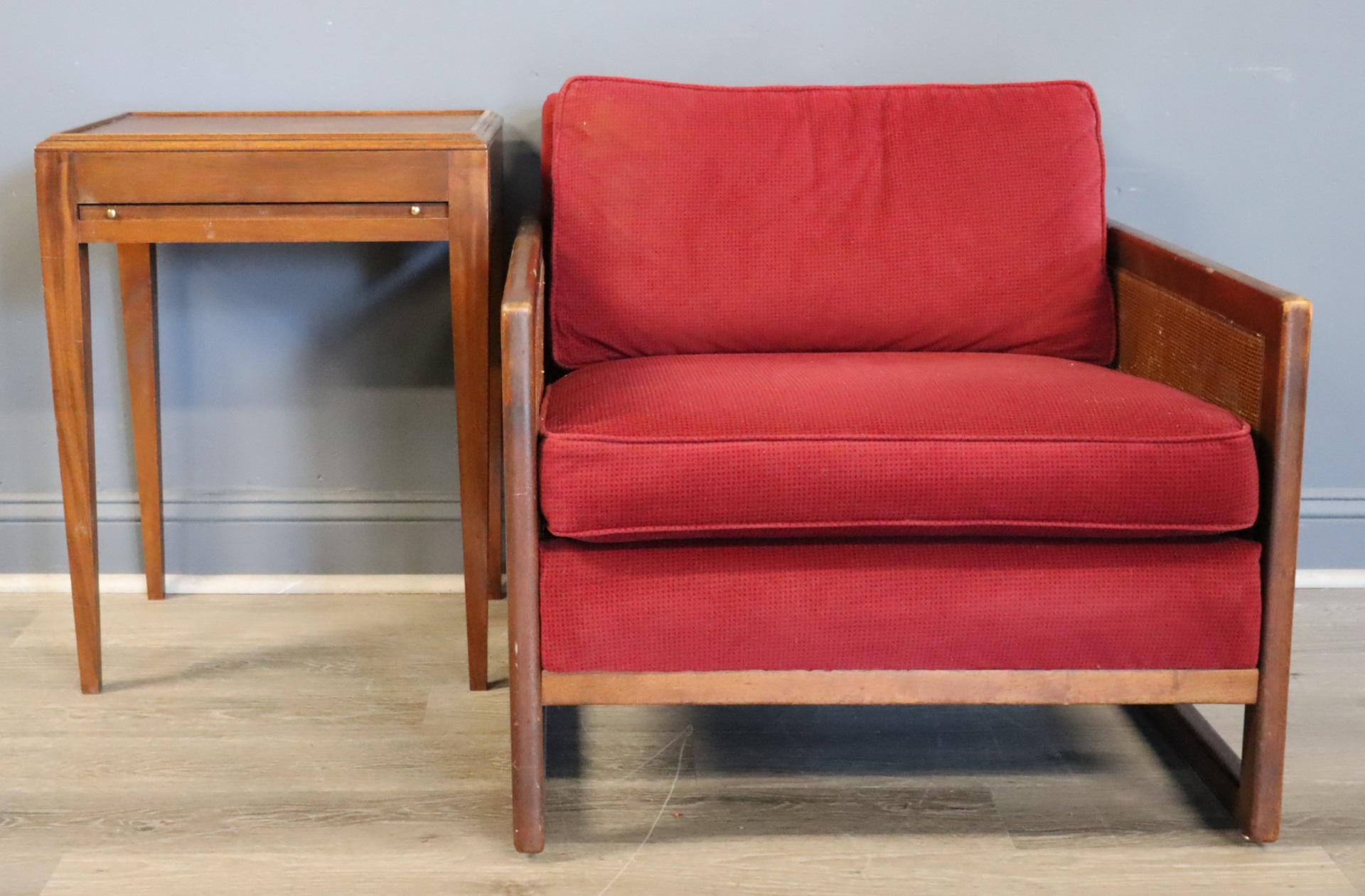 MIDCENTURY CANED CHAIR AND AN END TABLE.