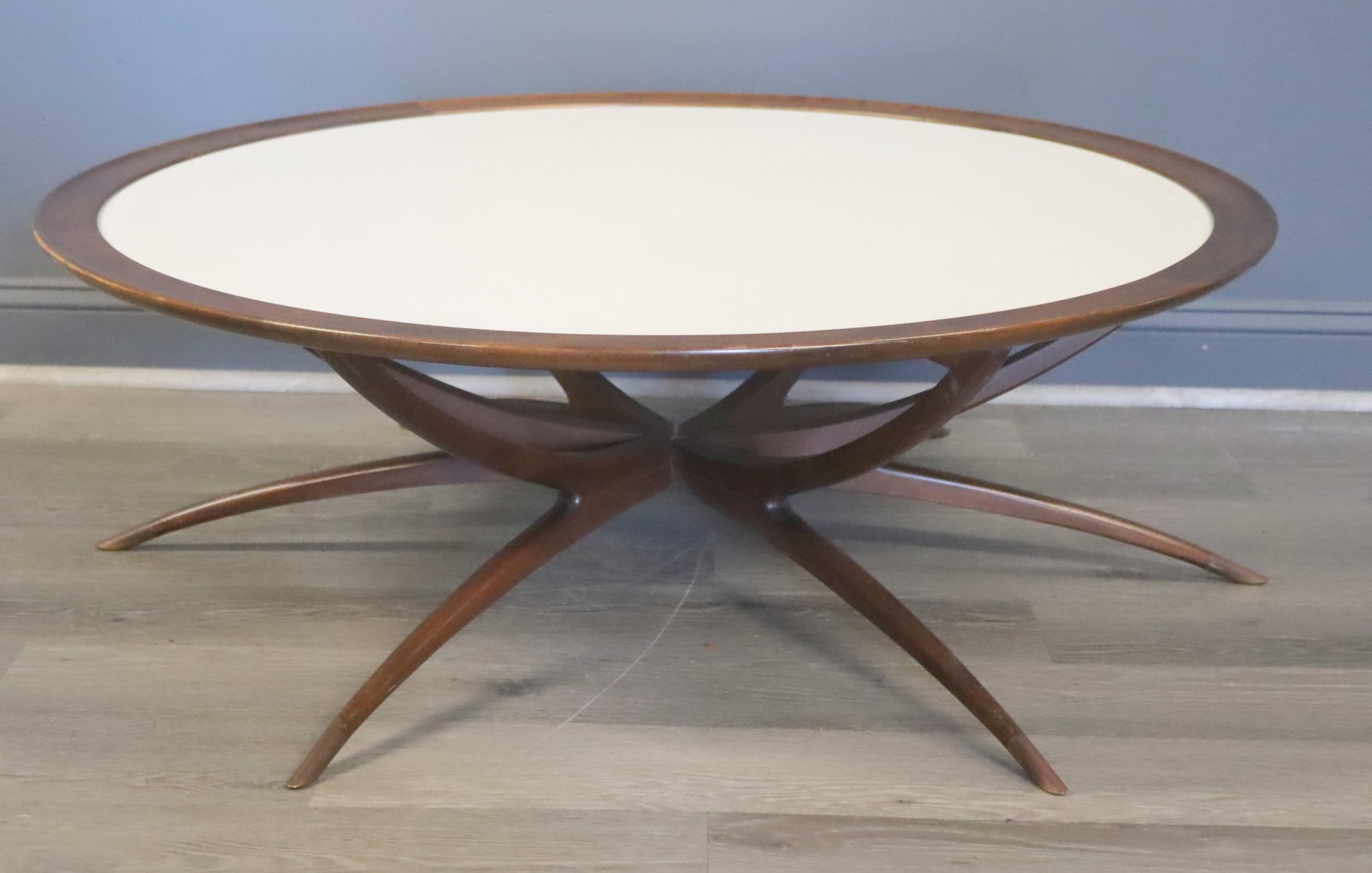 MIDCENTURY SPIDER BASE COFFEE TABLE.