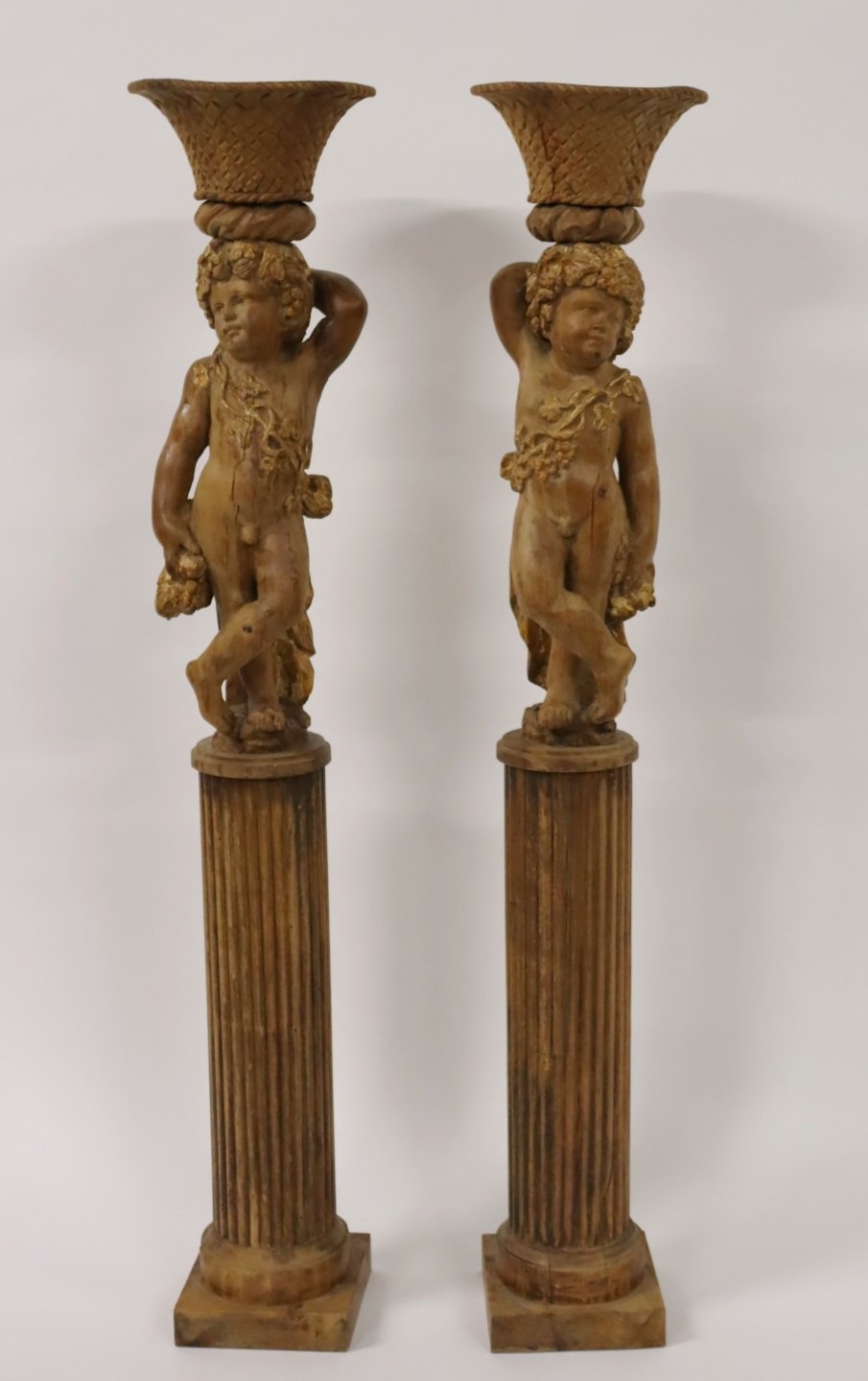 AN ANTIQUE PAIR OF CARVED WOOD