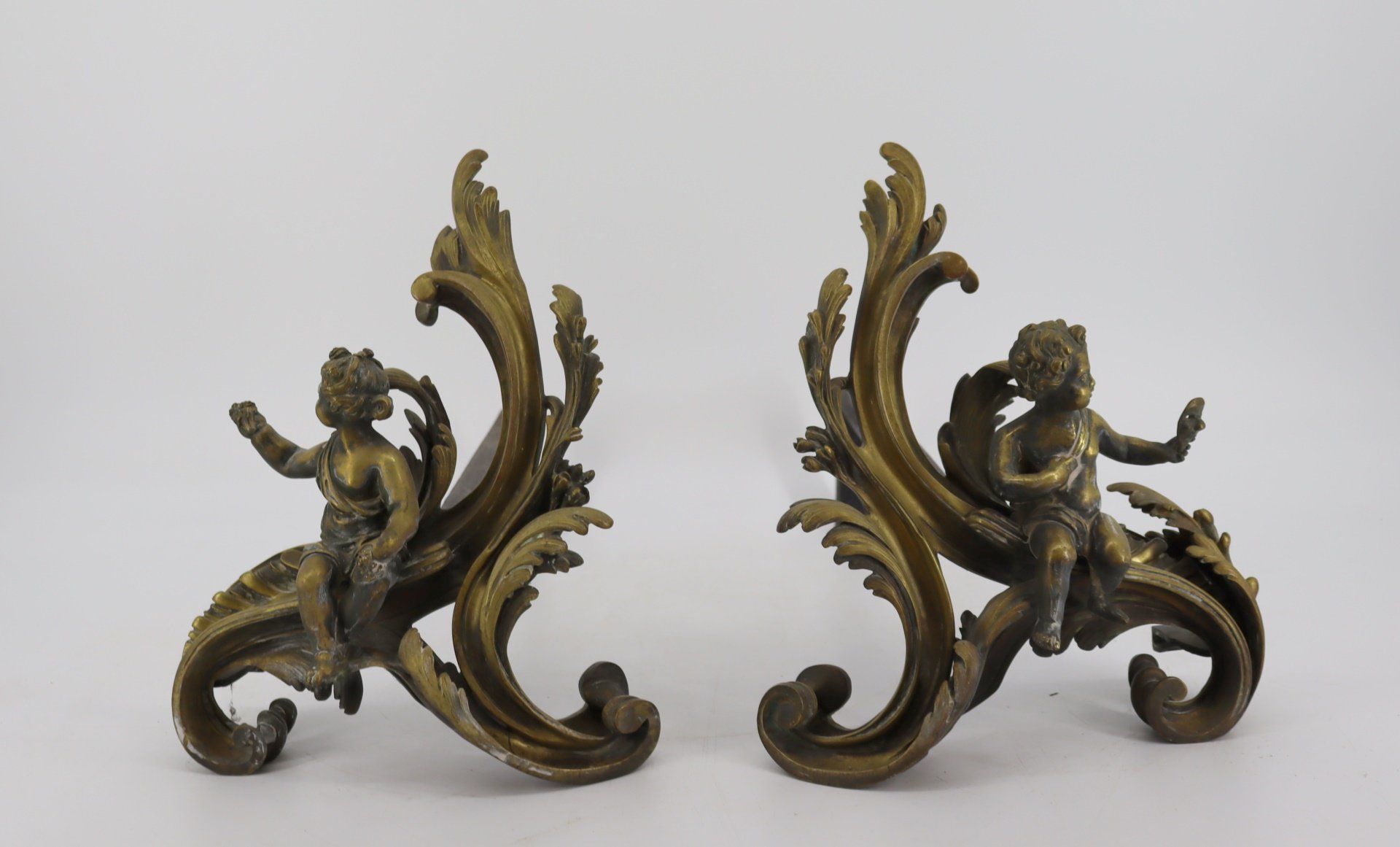 AN ANTIQUE PAIR OF PATINATED BRONZE 3bda16