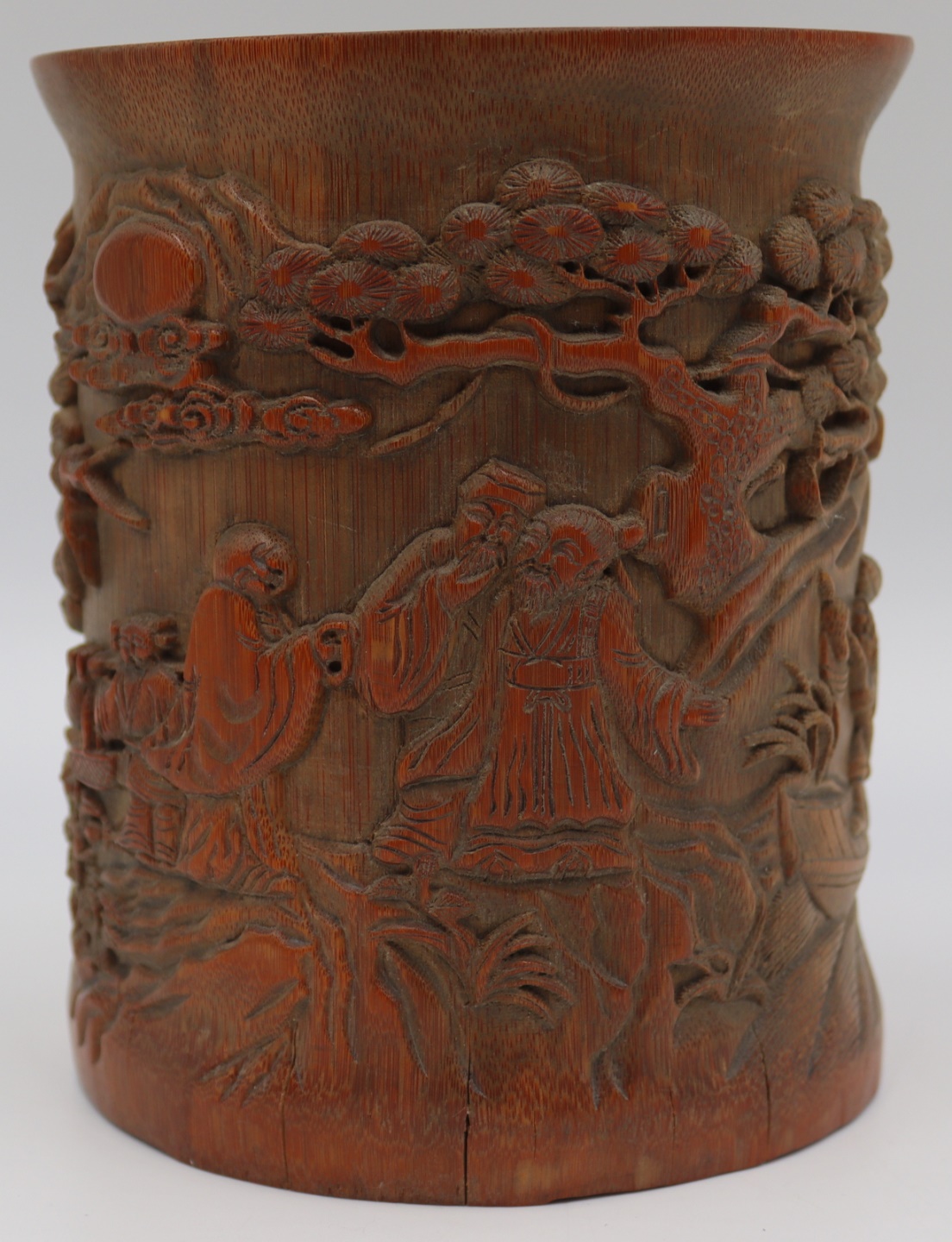 CARVED WOOD BRUSH POT. With fisherman,