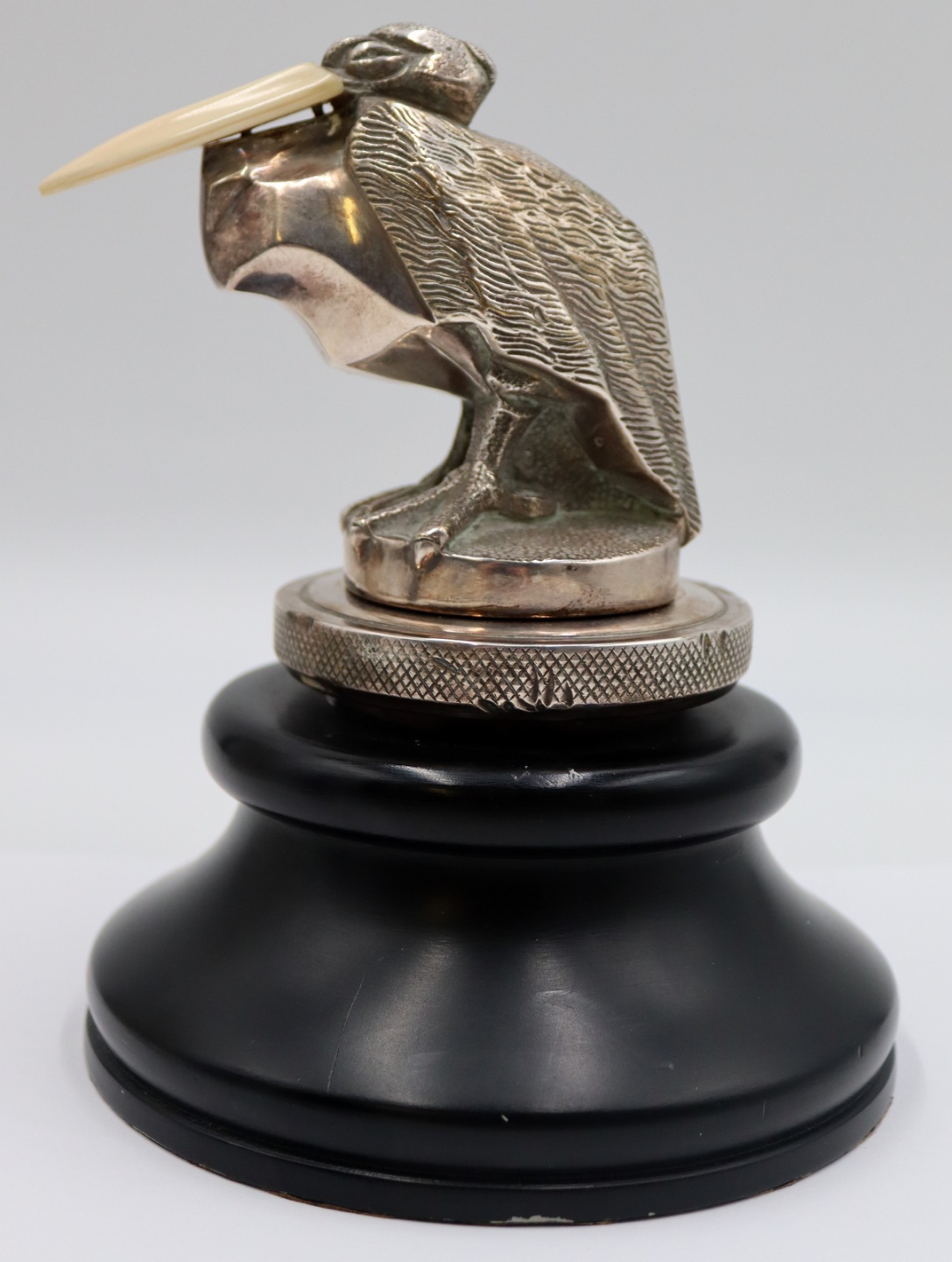 SILVERPLATE. SIGNED ART DECO BIRD