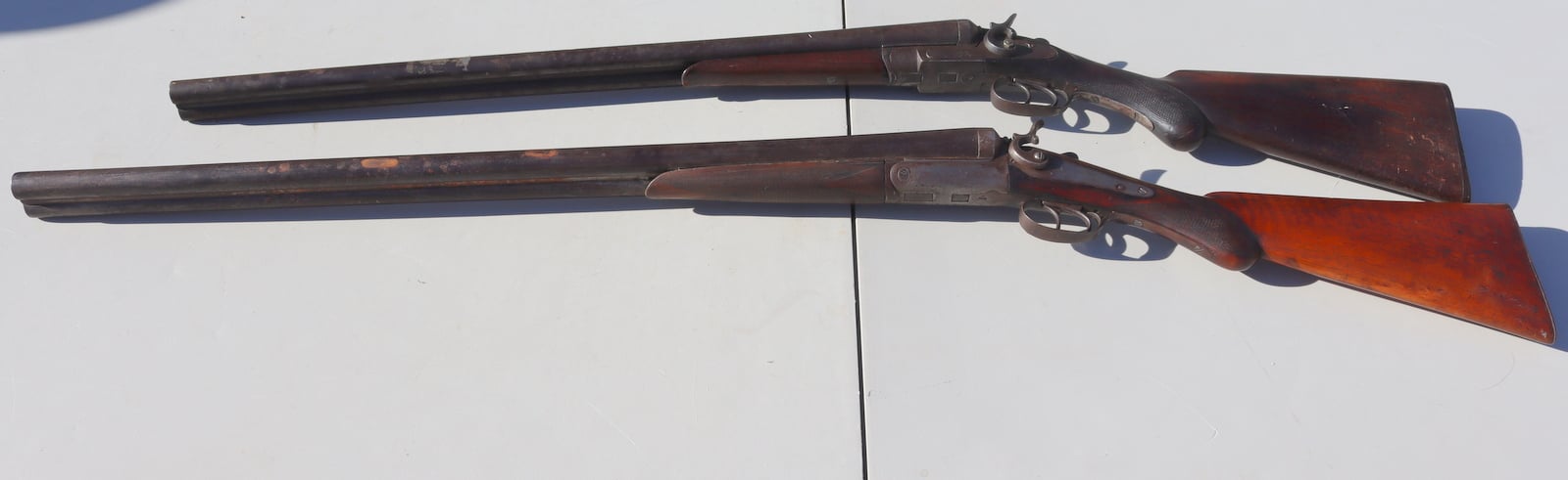 (2) ANTIQUE DOUBLE BARREL SHOTGUNS.