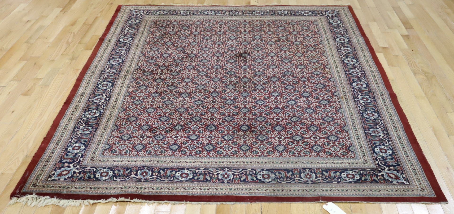 VINTAGE AND FINELY HAND WOVEN CARPET.