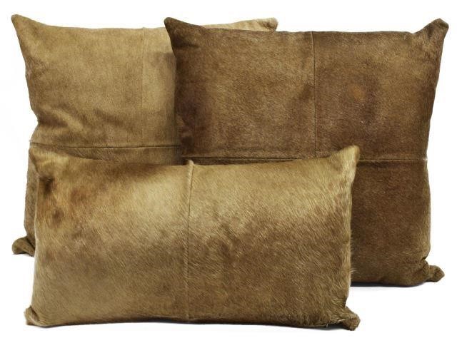 (3) DECORATIVE COWHIDE THROW PILLOWS(lot