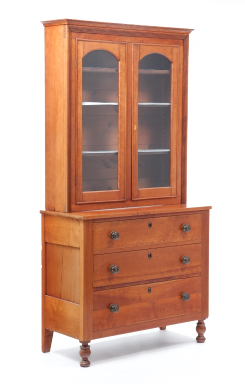 AMERICAN EMPIRE BOOKCASE ON CHEST.