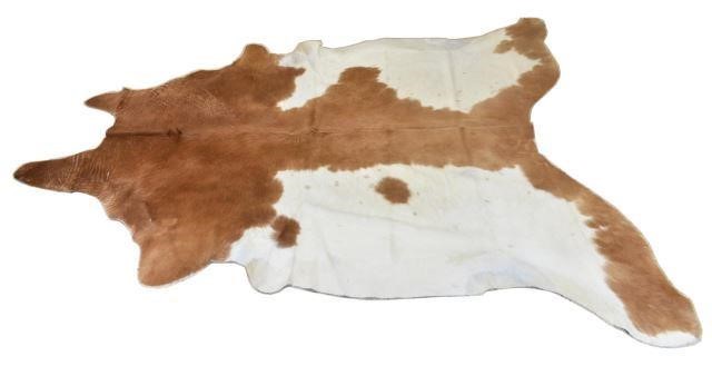 LARGE BRAZILIAN TANNED COWHIDE,