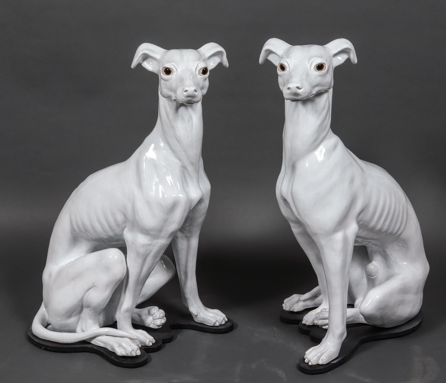 WHITE GLAZED CERAMIC WHIPPET SCULPTURES,