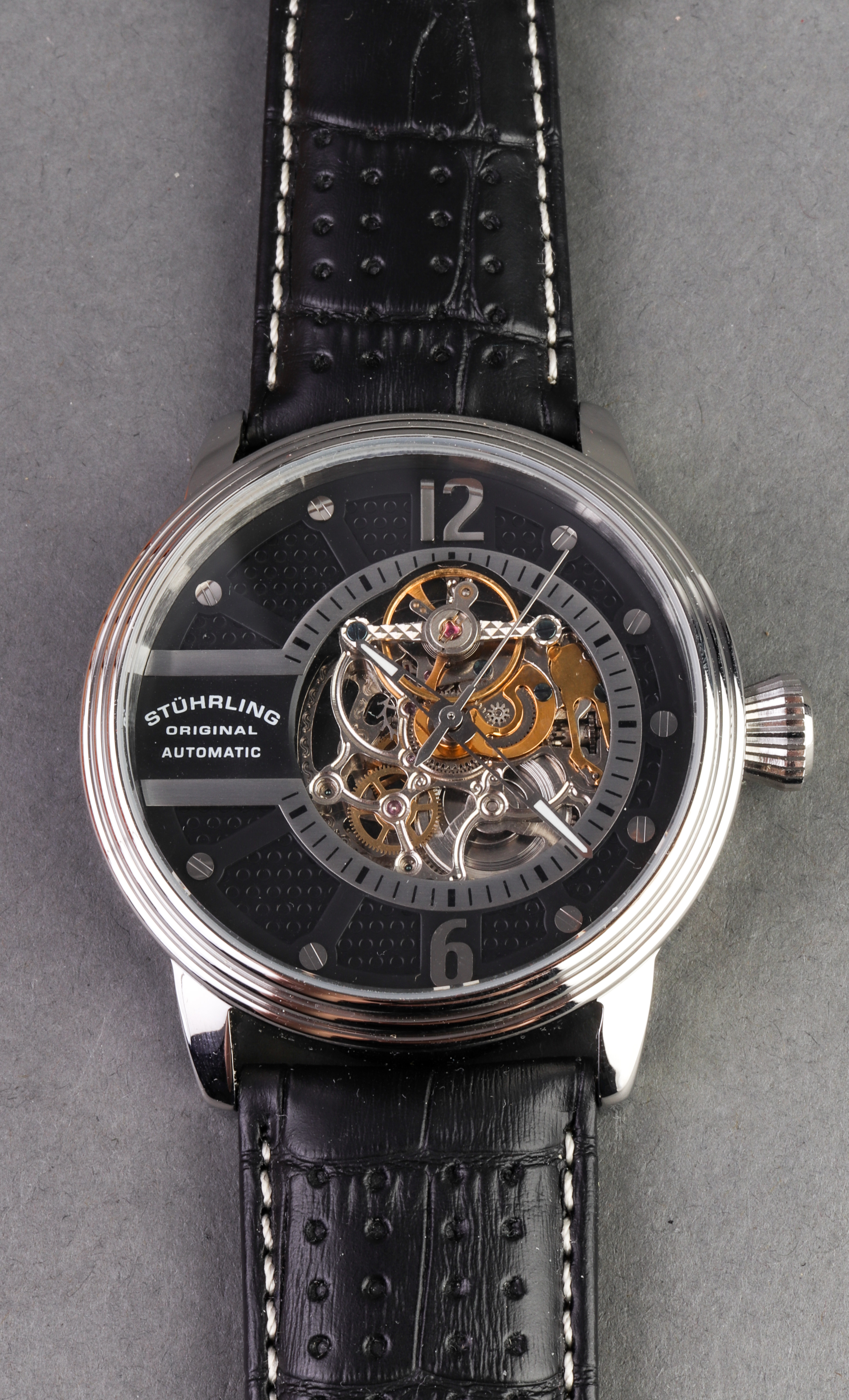 STUHRLING STAINLESS STEEL SKELETON WATCH