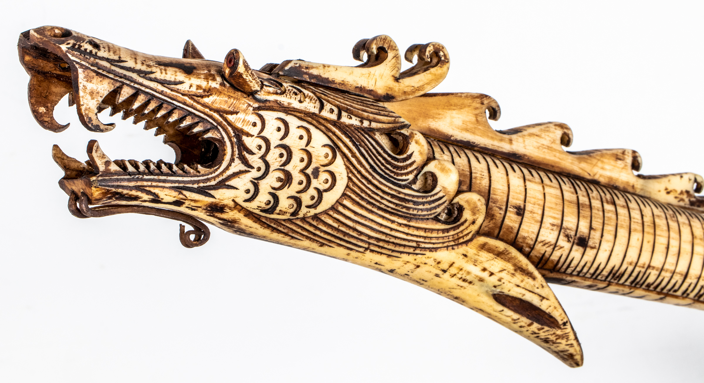 CHINESE CARVED BONE DRAGON FORM