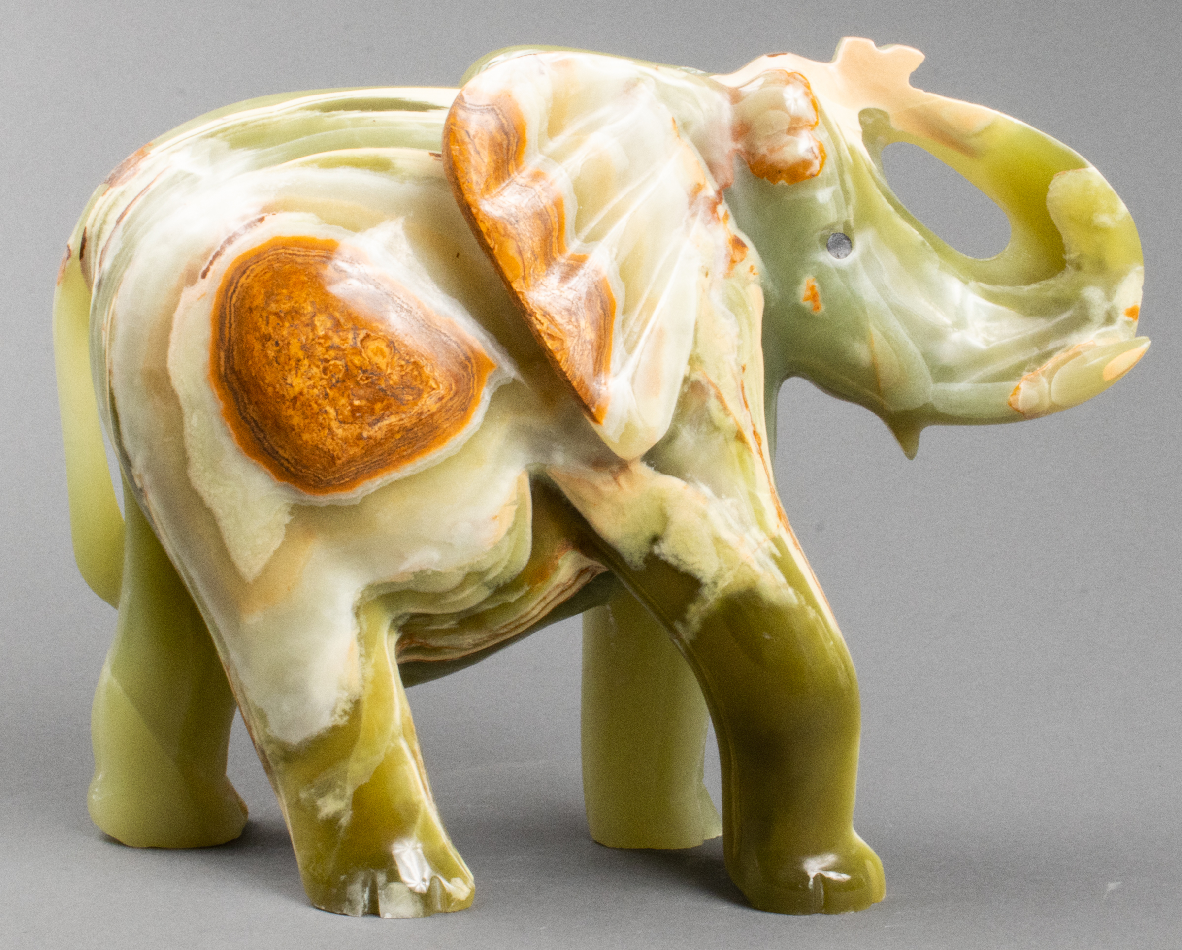 LARGE CARVED GREEN ONYX ELEPHANT