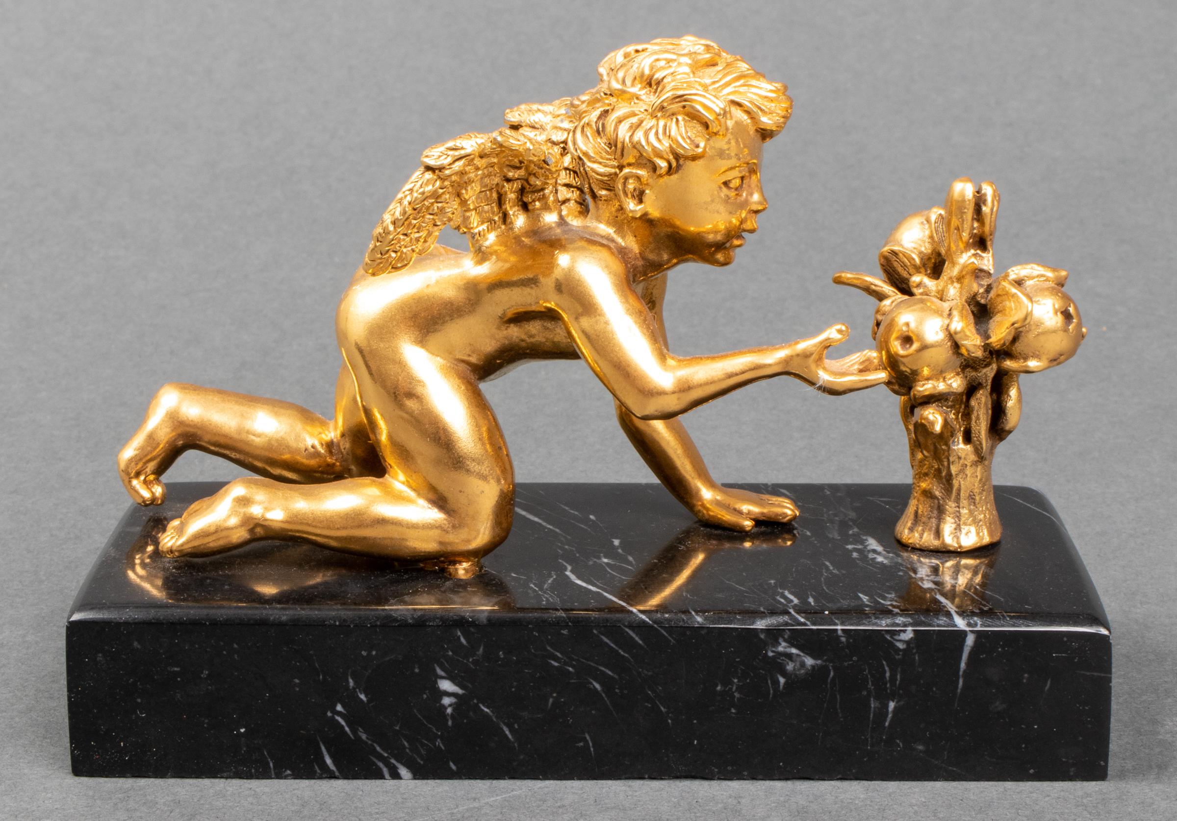 GILT METAL AND MARBLE CHERUB PAPERWEIGHT