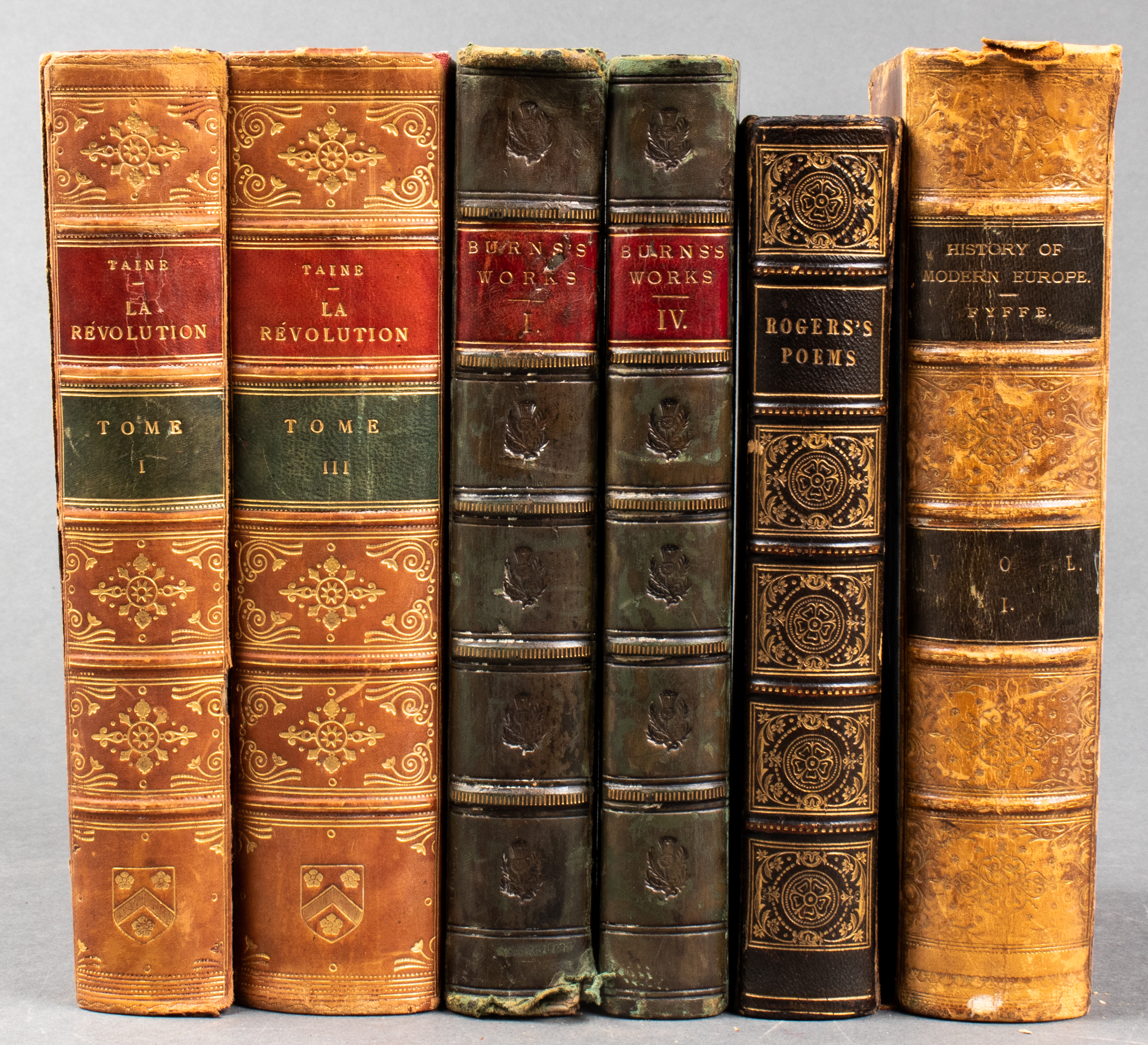 GROUP OF LEATHER BOOKS AND BINDINGS,