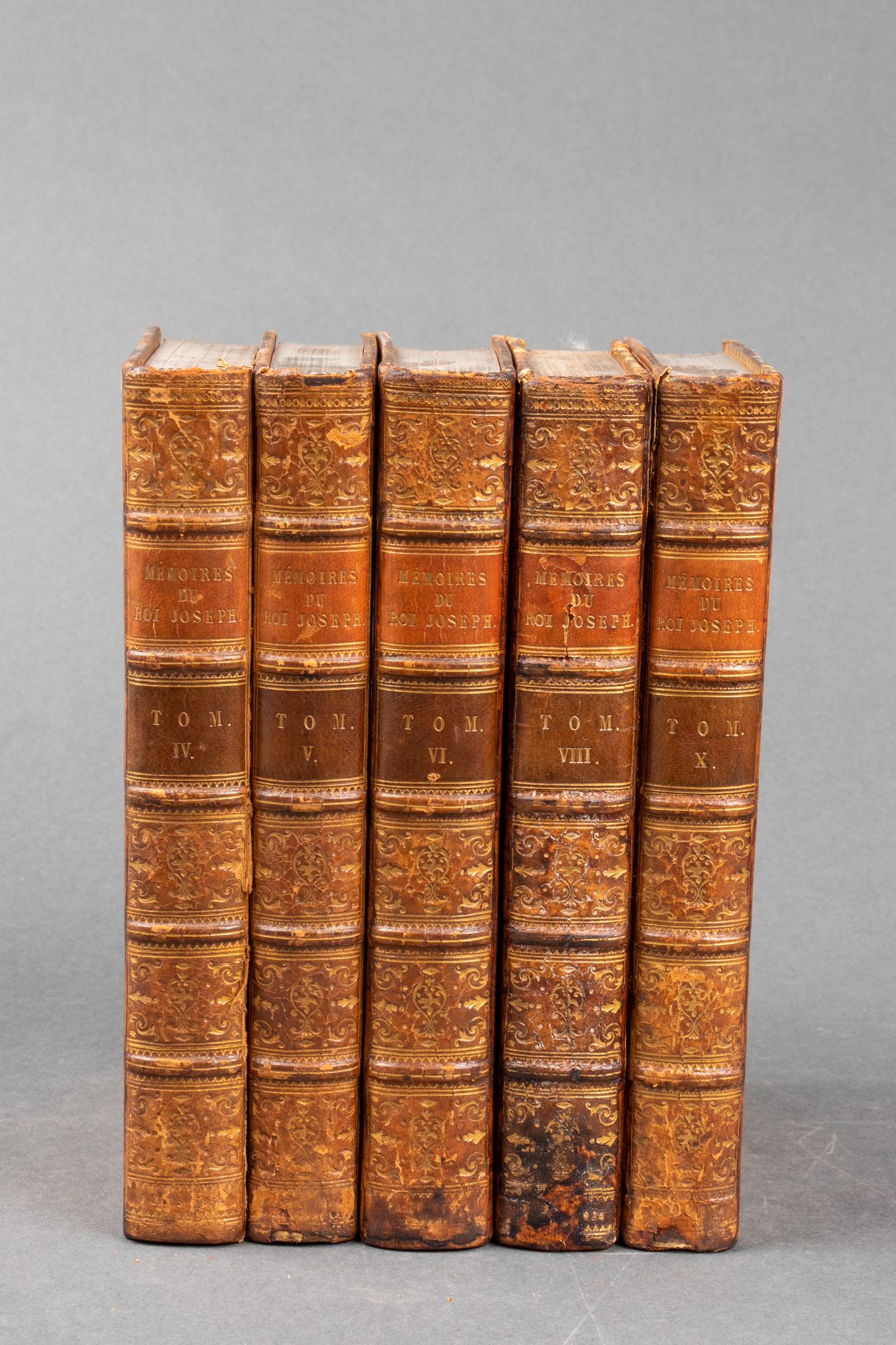 GROUP OF LEATHER BOOKS AND BINDINGS,