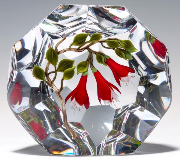 A FACETED PILLAR PAPERWEIGHT SIGNED