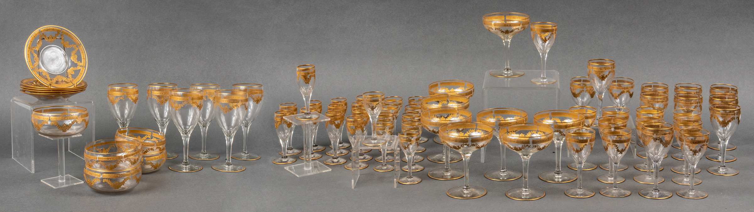 GILT-TRIMMED GLASS STEMWARE, 67