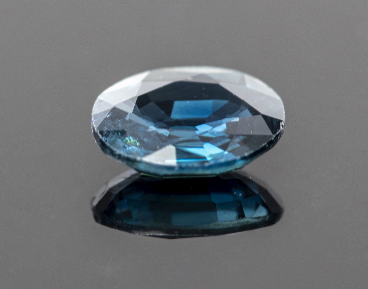 0.60 CT. LOOSE OVAL BLUE SAPPHIRE