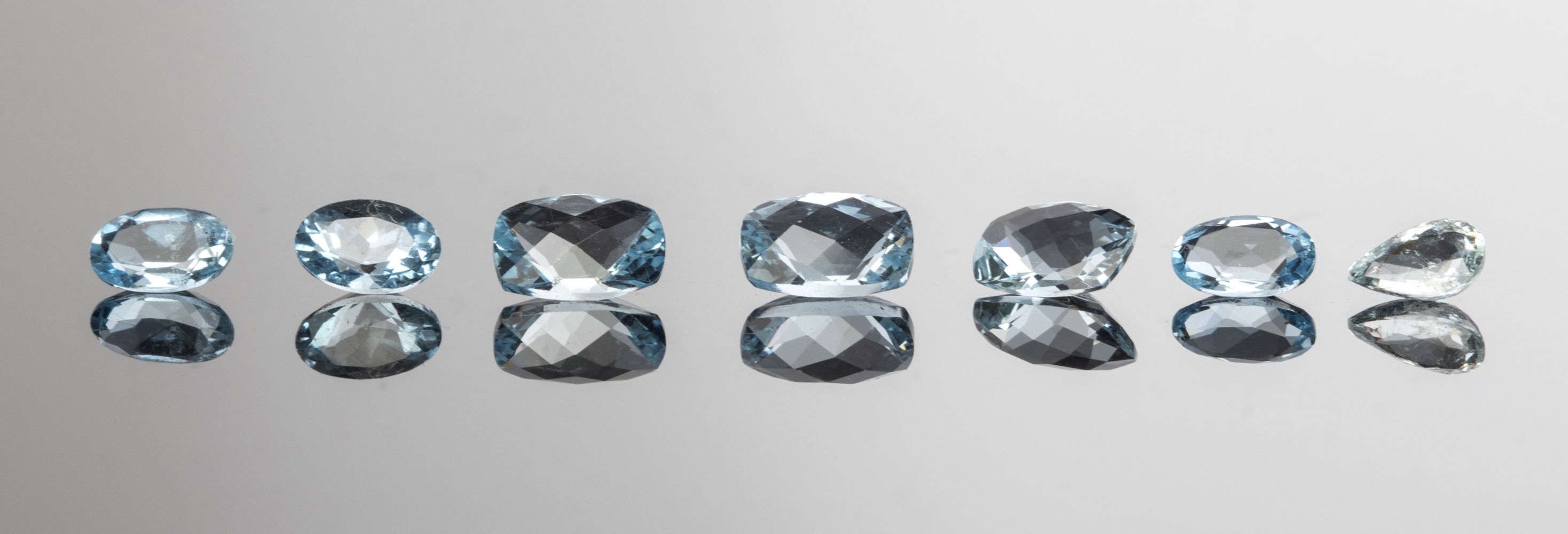 4 CTTW. LOOSE MIXED -CUT AQUAMARINE