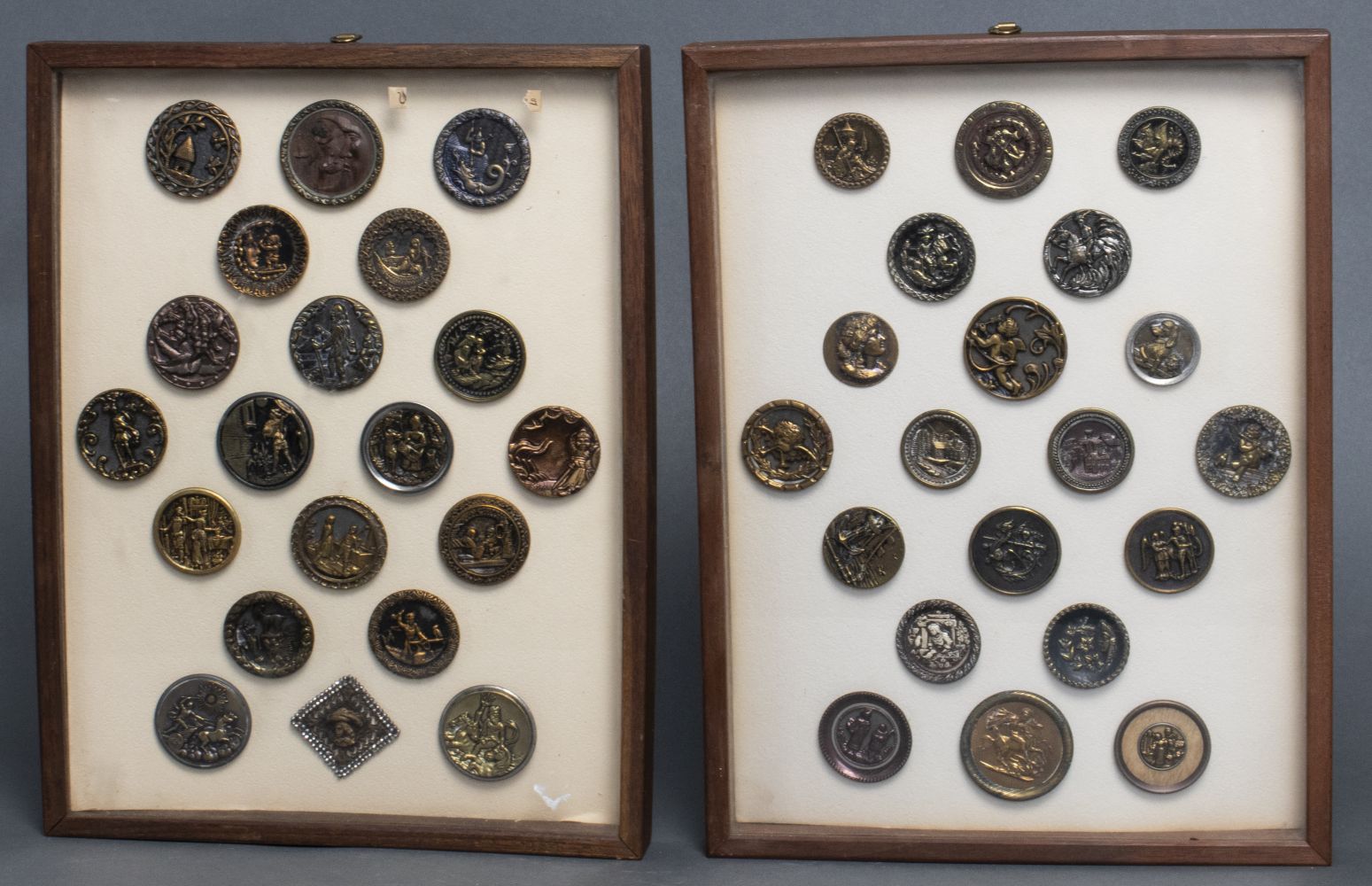 FRAMED COLLECTION OF METAL BUTTONS