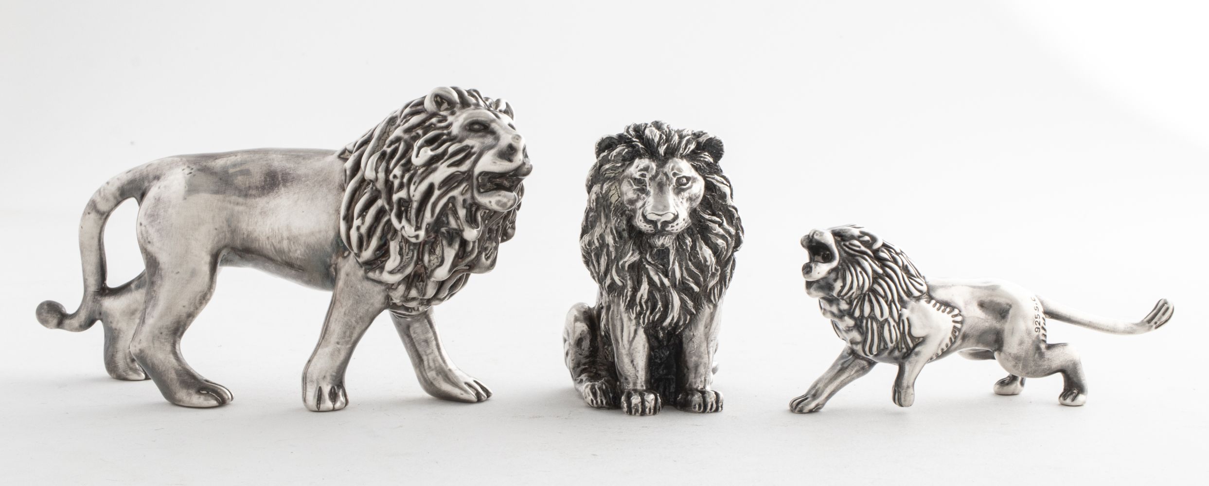 ASSORTED STERLING SILVER CLAD LION