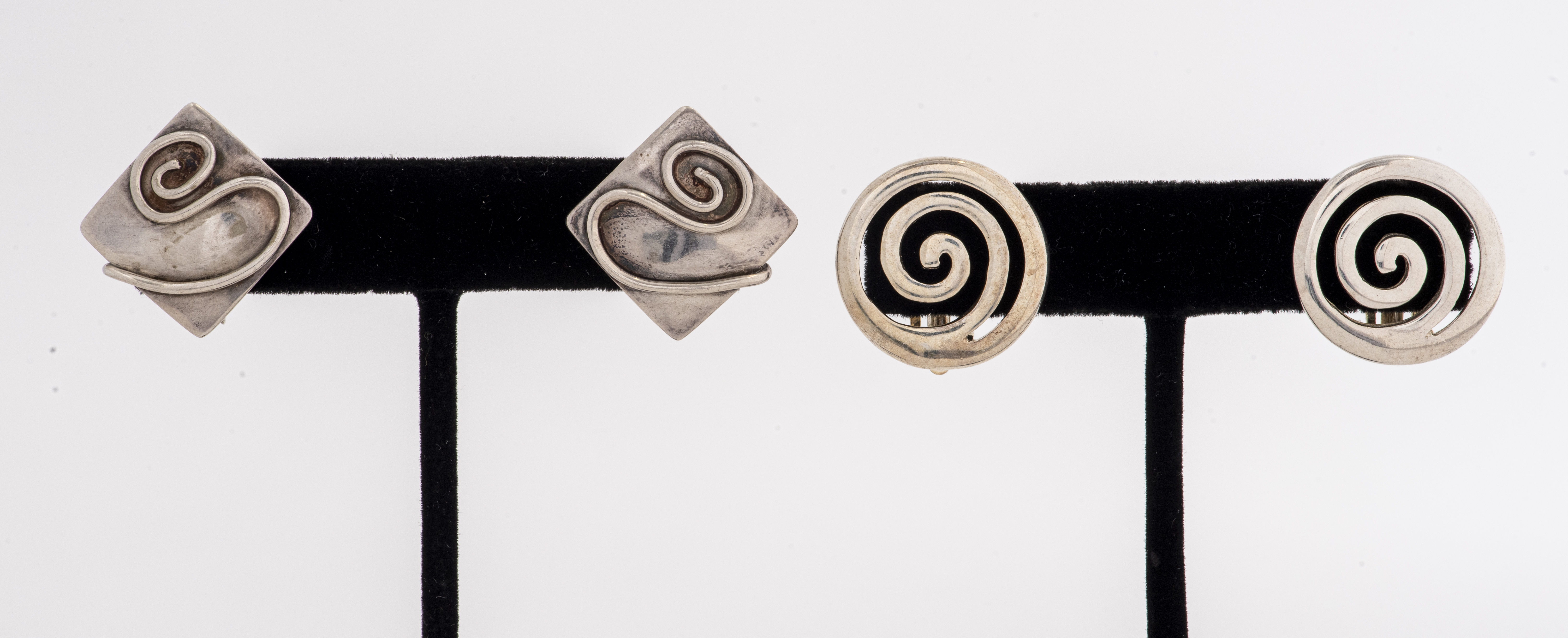 TWO PAIRS OF VINTAGE SILVER SWIRL
