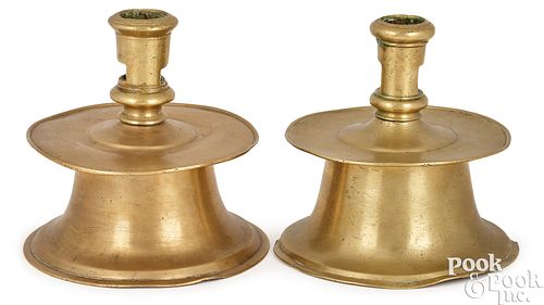 TWO SIMILAR BRASS CAPSTAN CANDLESTICKS  3c5cd3