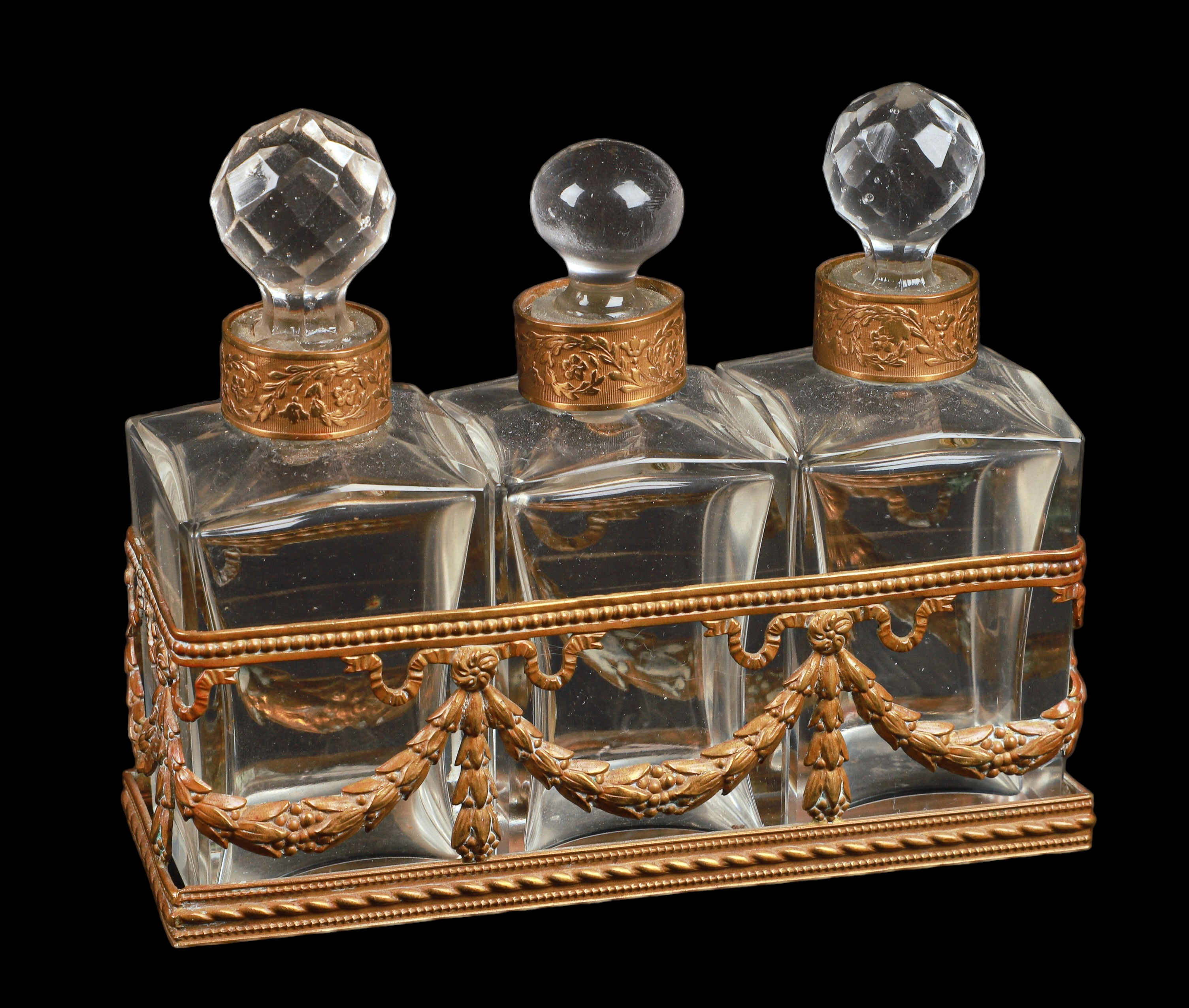 Triple crystal scent bottles in gilt