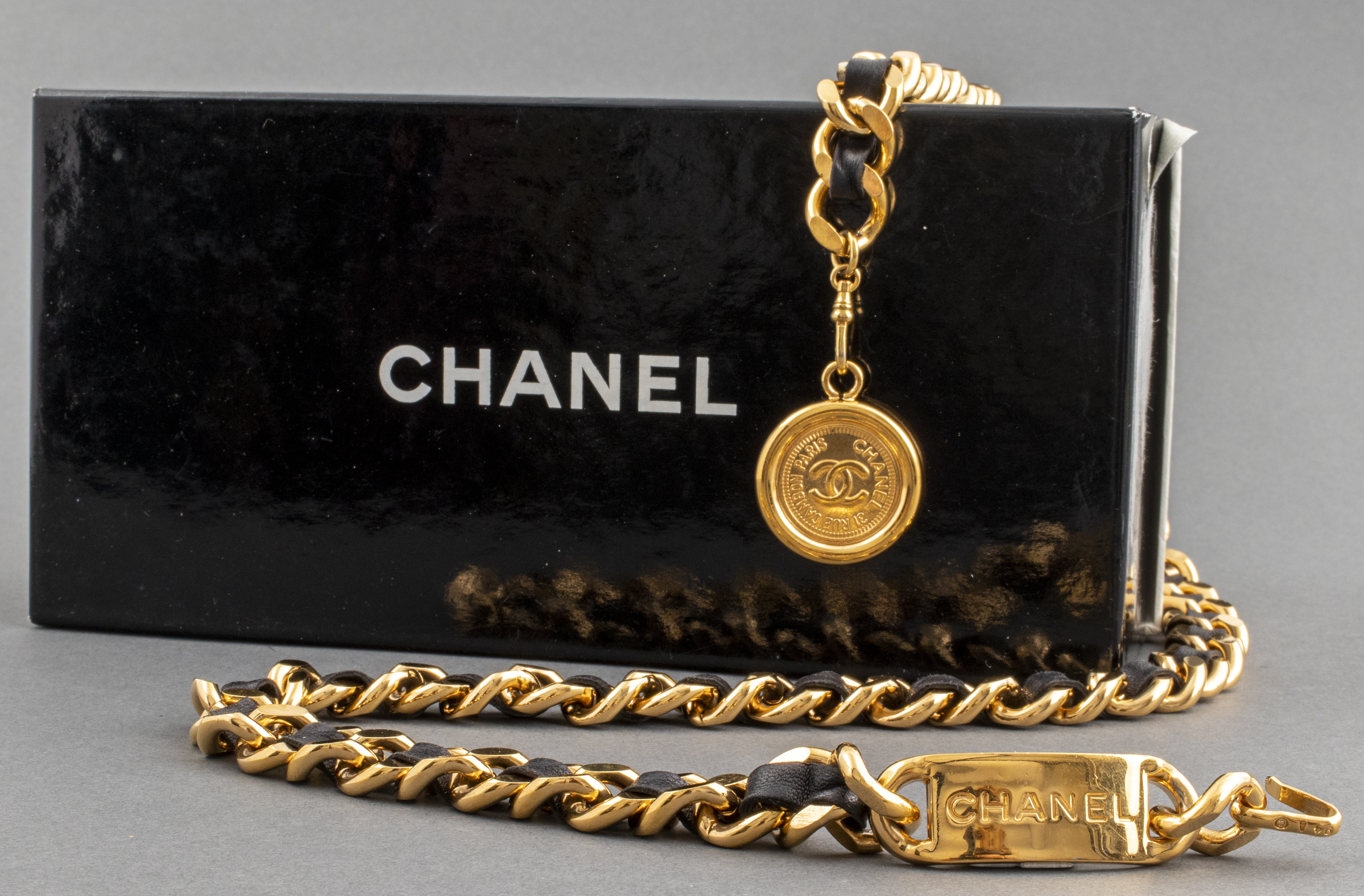 CHANEL GOLD-TONE LINK AND BLACK