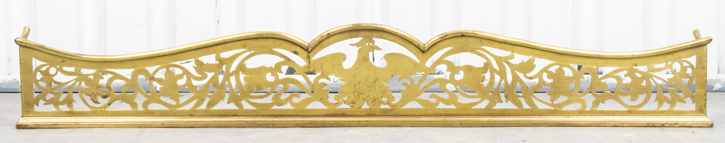 ENGLISH PIERCED BRASS FIREPLACE FENDER