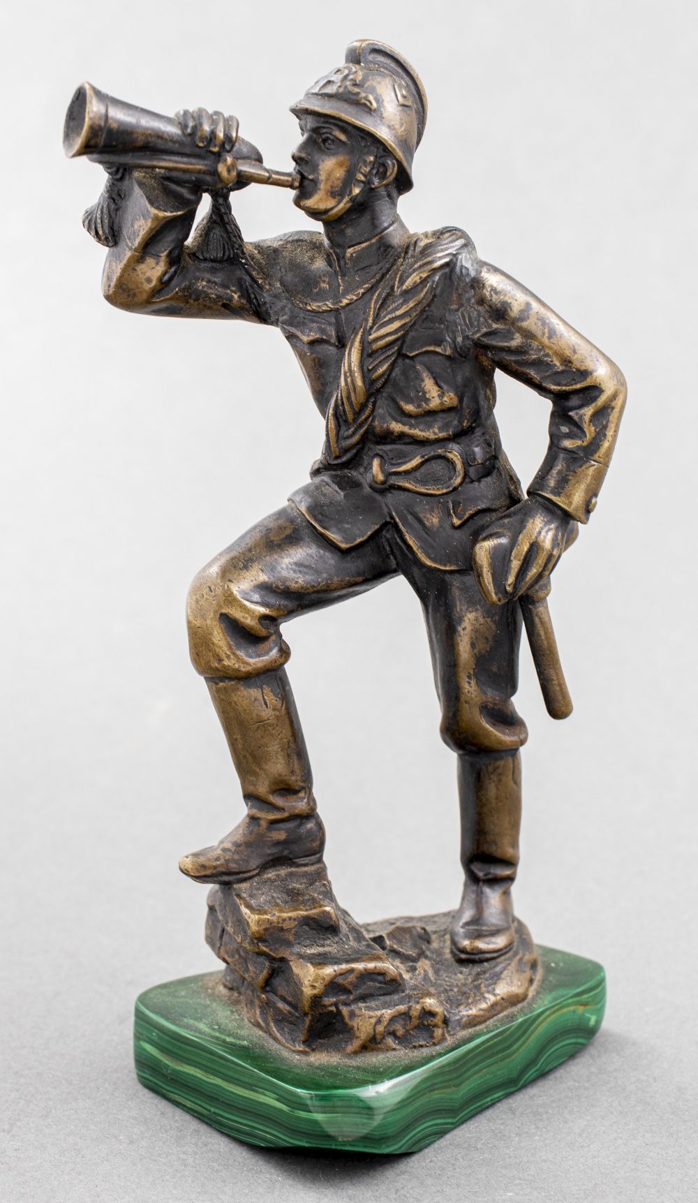 BRONZE MODEL OF A SOLDIER W HORN