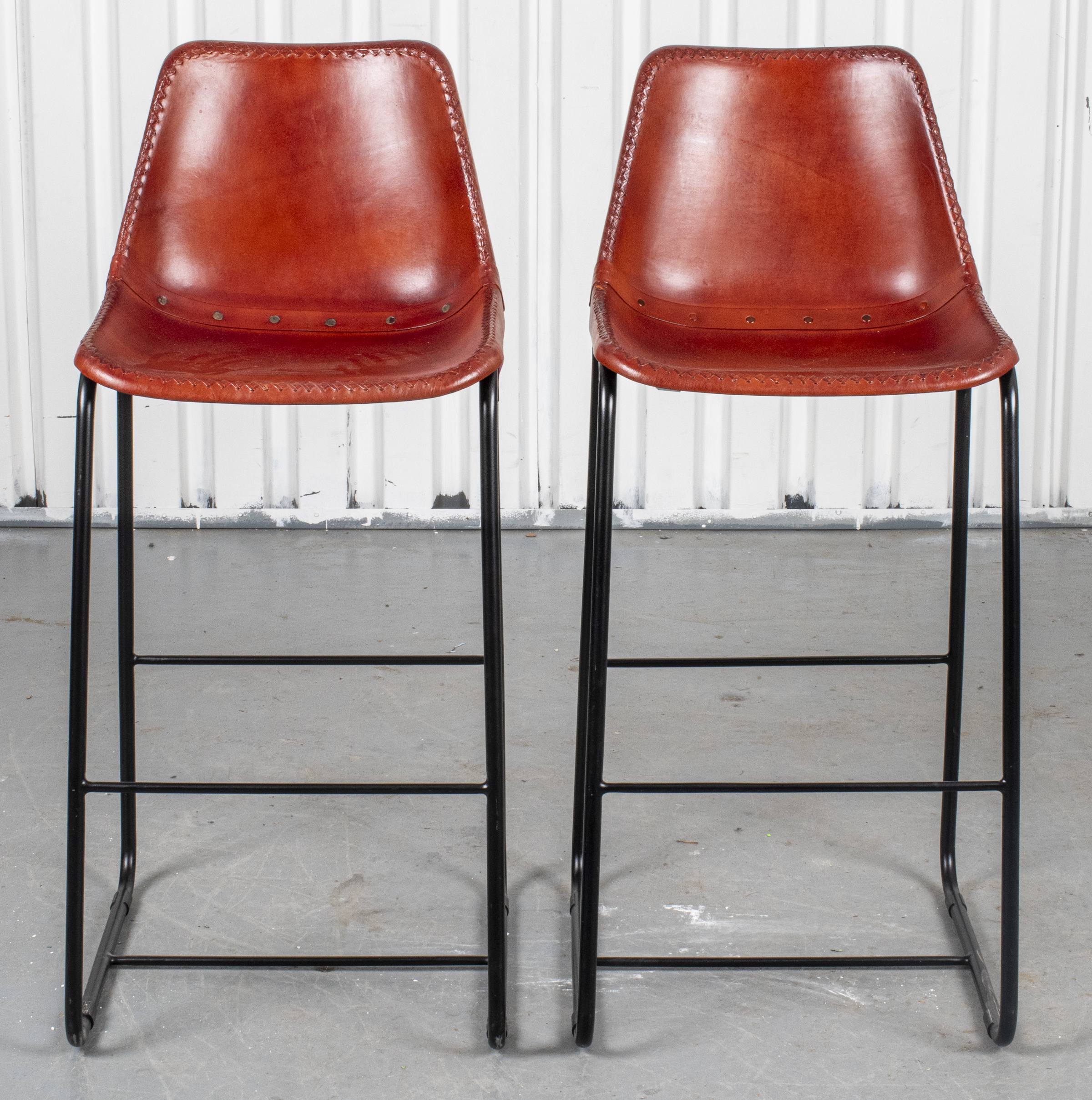 LEATHER UPHOLSTERED TALL STOOLS,
