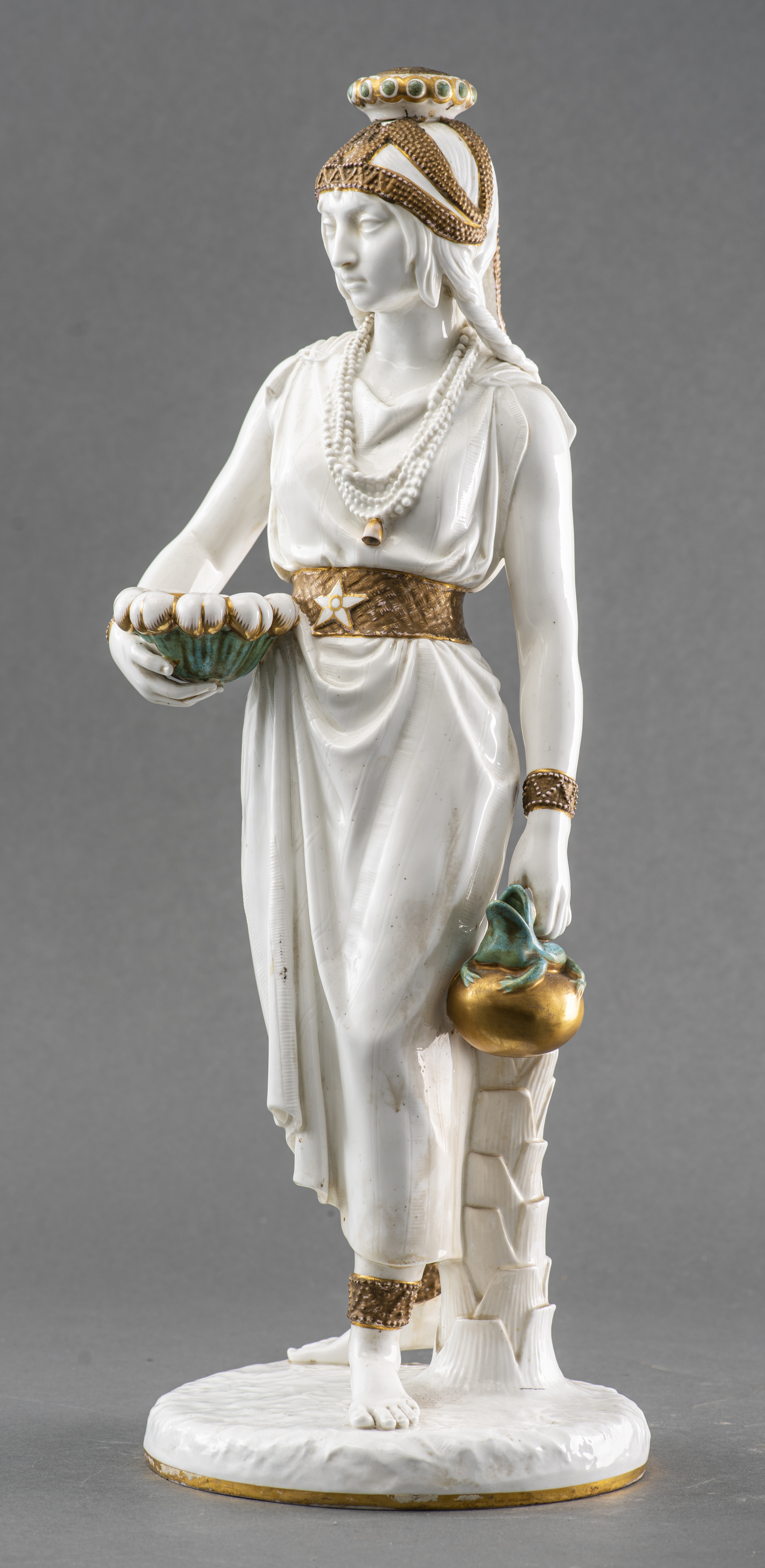 ENGLISH PORCELAIN SCULPTURE OF A WOMAN