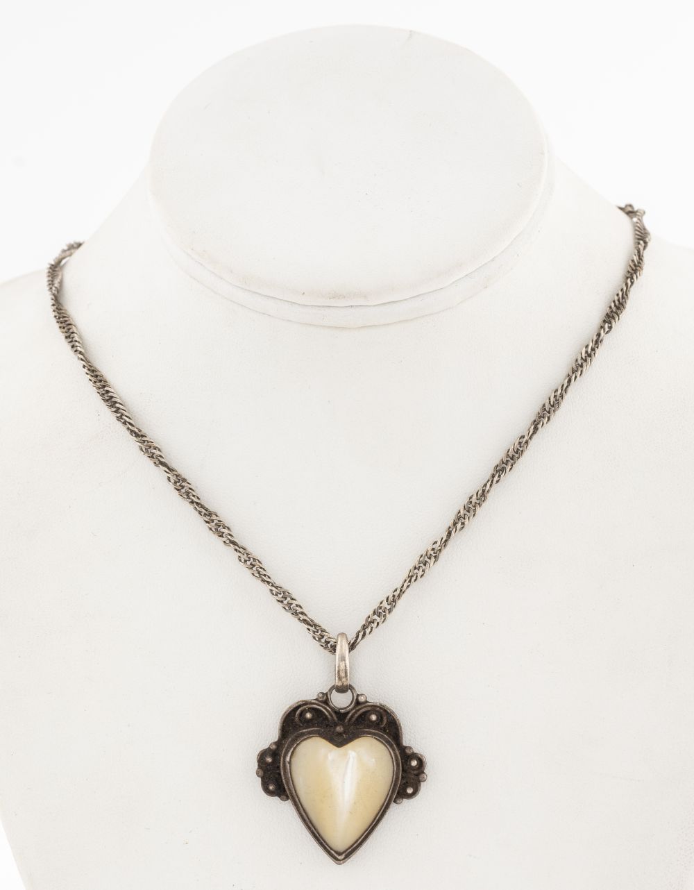 NAVAJO SILVER MOTHER-OF-PEARL HEART