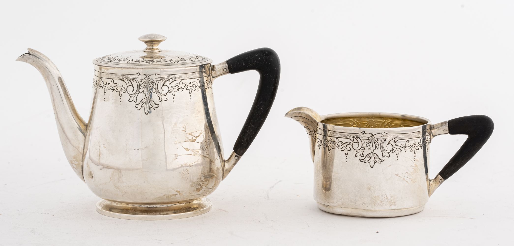 STERLING SILVER TEAPOT AND CREAMER,