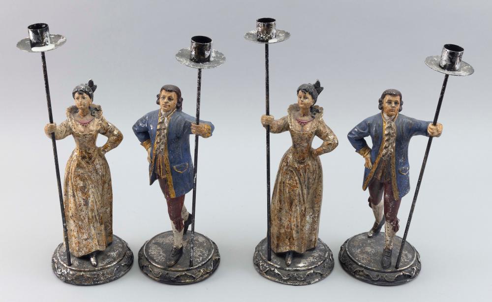 SET OF FOUR FIGURAL CANDLE HOLDERS