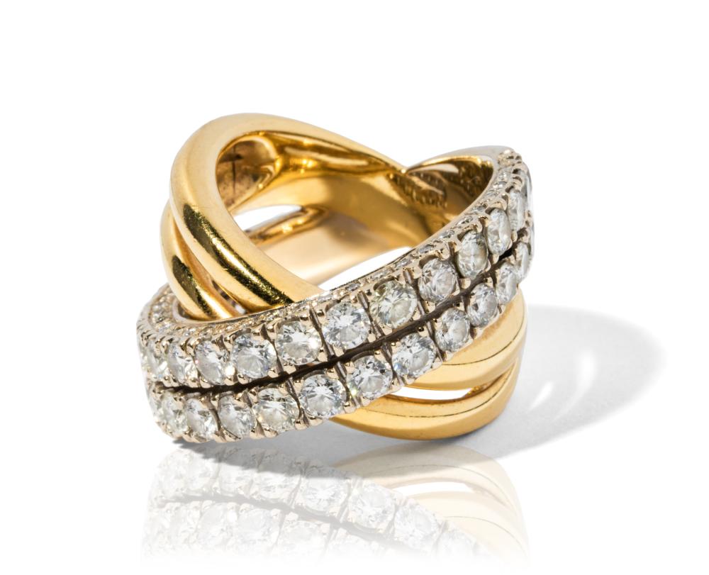 18 KARAT GOLD AND DIAMOND RING18