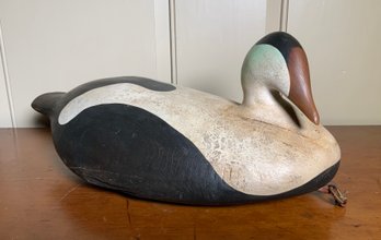 A ca. 1985 carved and painted wood
