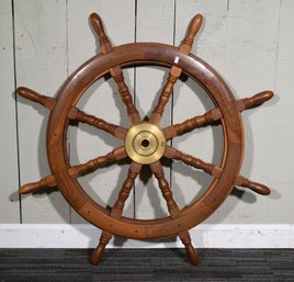 A vintage eight spoke wood ships