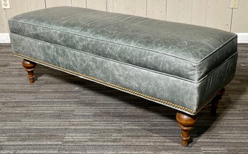 A contemporary green leather ottoman 3c8821