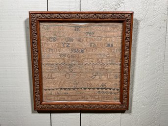 An antique needlework sampler,