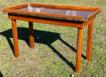 An antique table, a gallery top