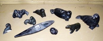 A collection of eight Inuit carved