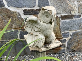 A vintage glazed concrete owl figure